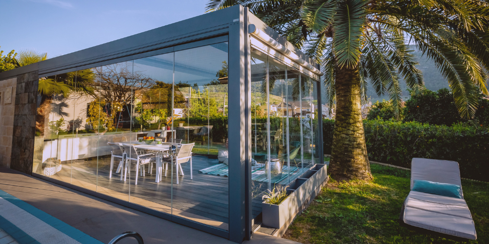 Las cortinas de cristal unen ambientes