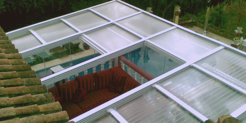 Cuantos tipos de cerramientos para terraza existen - Techos móviles de cristal
