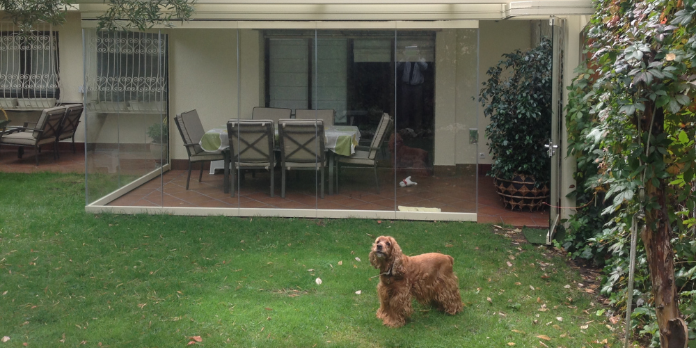 Acristalar terraza para invierno con cortinas de cristal abatibles sin guía inferior