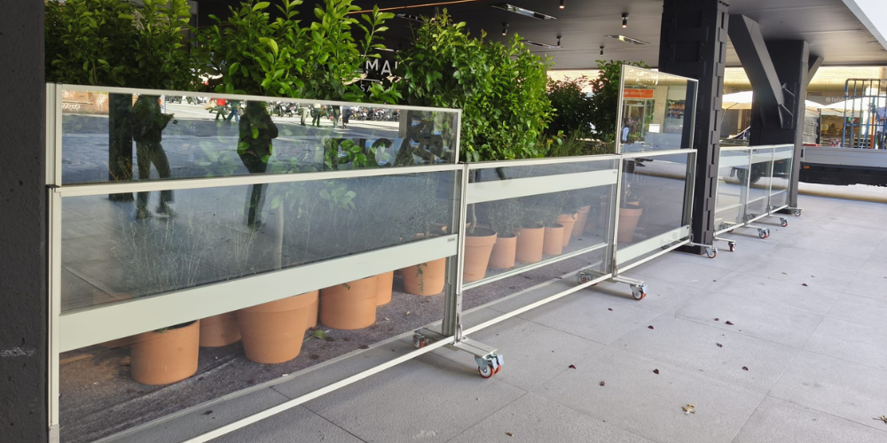 Cerramientos de cristal para terrazas con paravientos de cristal